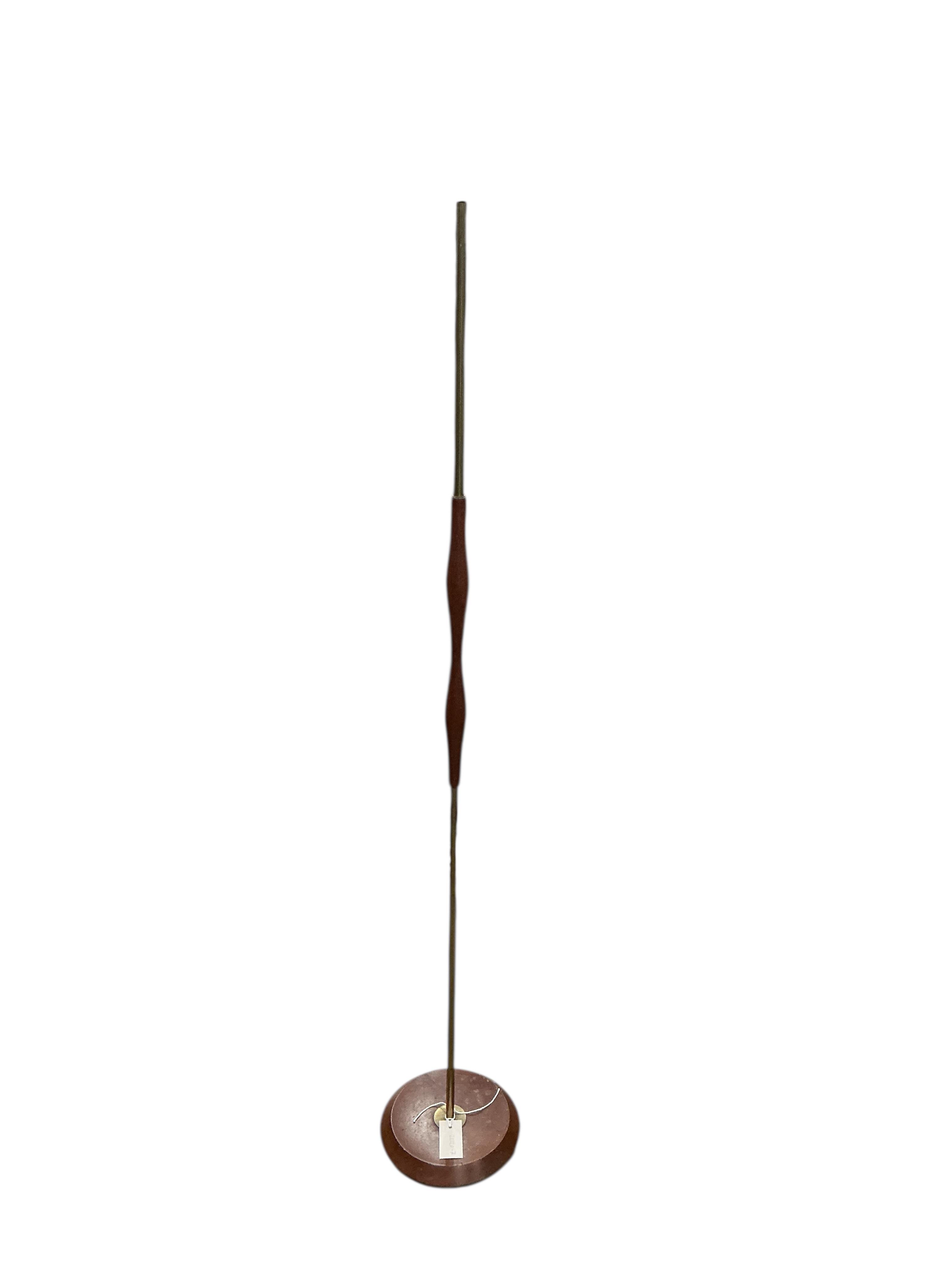 A mid century teak and brass standard lamp, height 146cm
